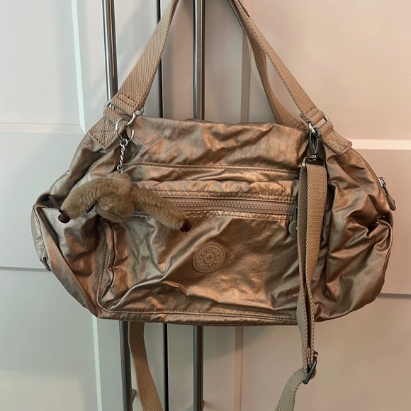 Kipling Bags Gently Used Kipling Bag In Gold Poshmark